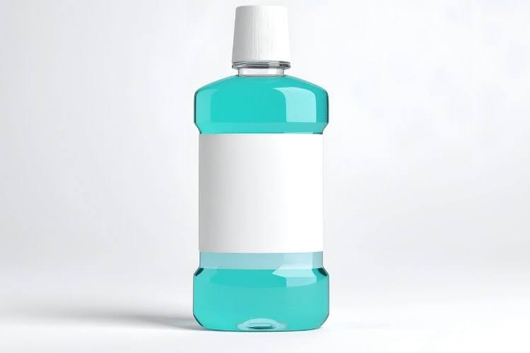 Antibacterial mouthwash bottle for oral hygiene and dental care.